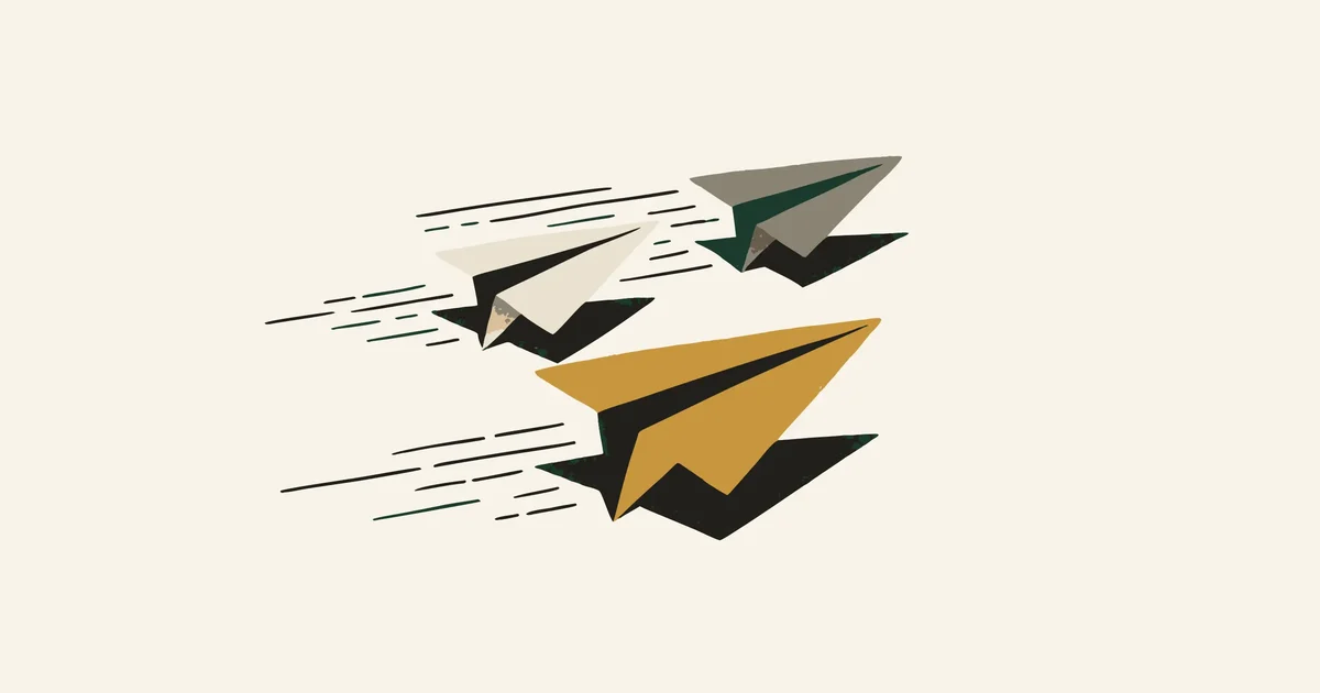 Three paper airplanes in formation with motion lines, the lead plane in gold