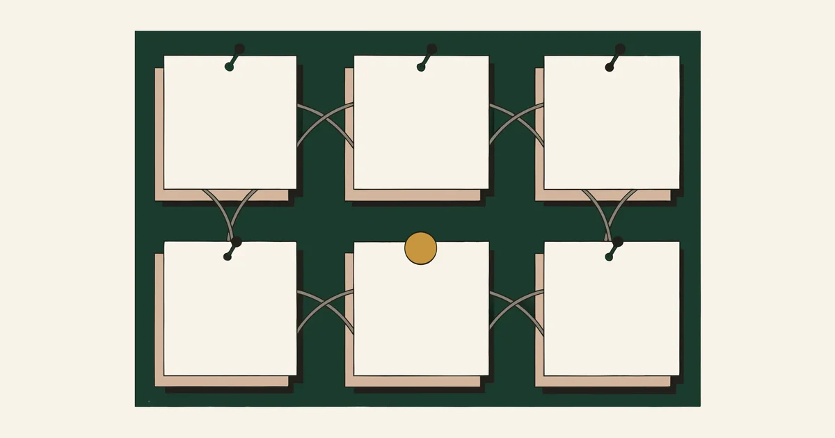 Corkboard with blank index cards connected by string, one gold pin at the center